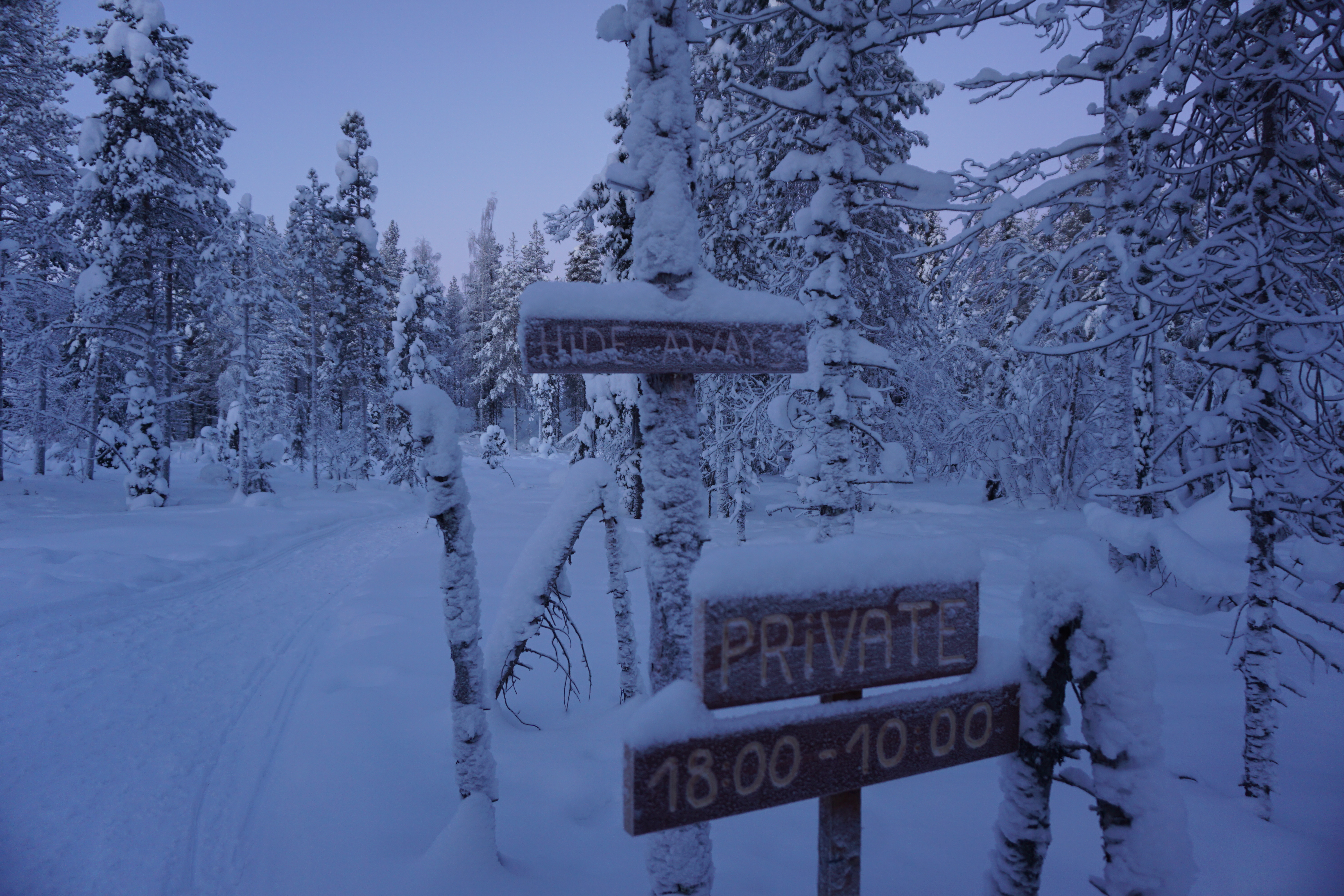 sign in snowy landscape